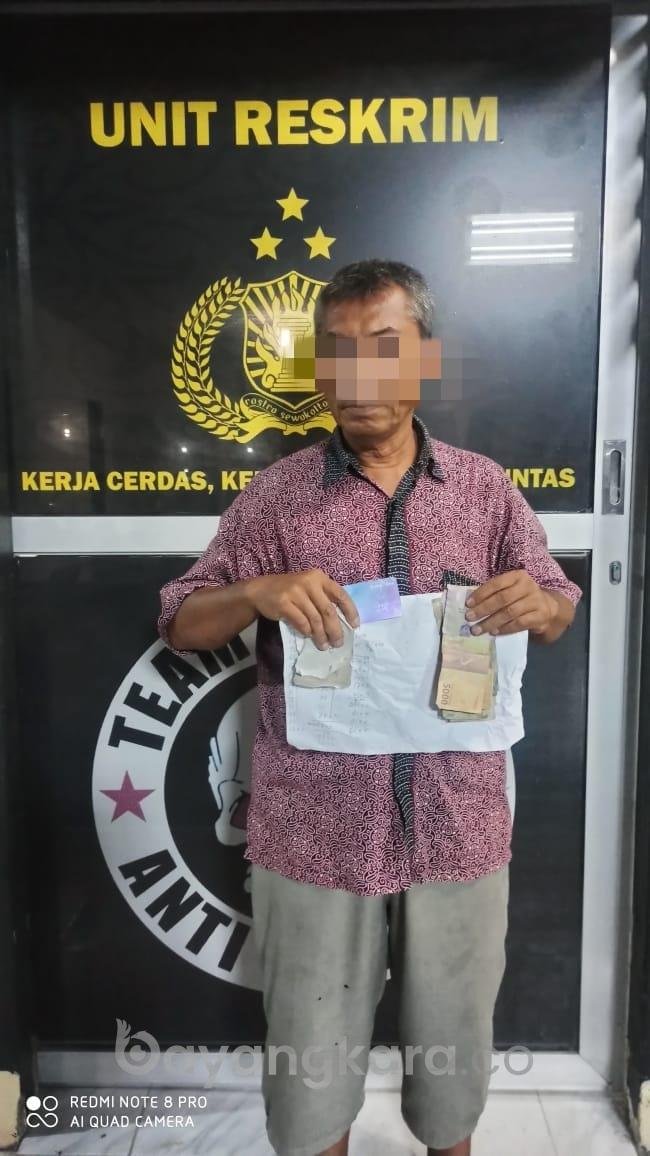 Polsek Labuhan Ruku Telah Mengamankan Terduga Bandar Judi Togel Online Di Tanjung Tiram.