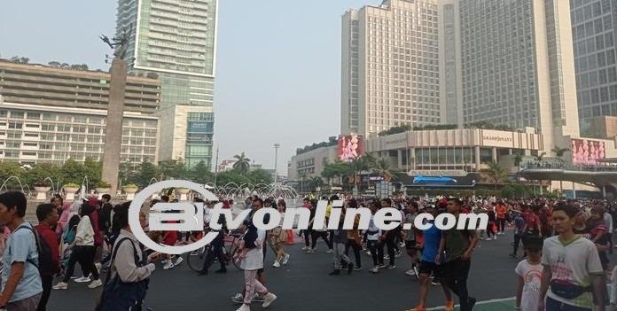 Warga Padati CFD Bundaran HI Minggu Pagi, Keramaian dan Aktivitas Seru di Jalanan Jakarta