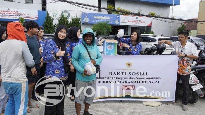 Kantor Imigrasi Medan Gelar Bakti Sosial, Bagikan Makanan Bergizi untuk Warga Terdampak