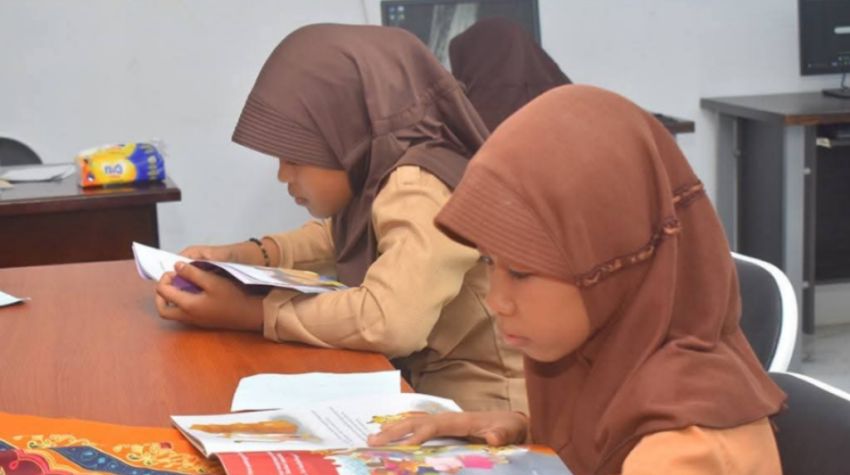 Literasi Si Kecil: Perpustakaan Digital Desa Bogak Hidupkan Semangat Membaca Sejak Dini