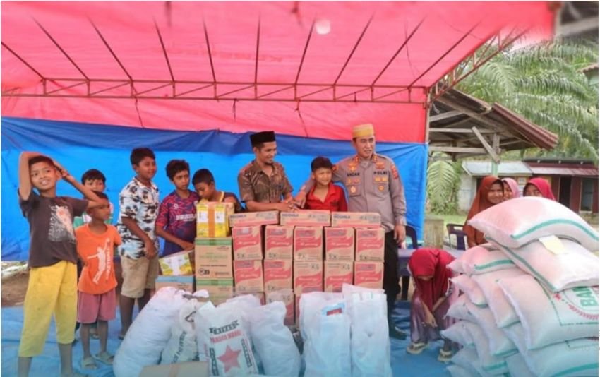 Kapolres Lhokseumawe Bawa Bantuan dan Semangat bagi Korban Banjir Aceh Utara