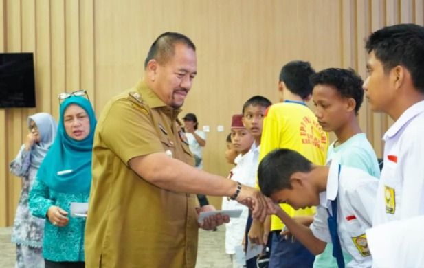 Bupati Batu Bara Apresiasi Aksi TP PKK Sambut HUT ke-81 RI, Gelar Santunan hingga Tanam Pohon