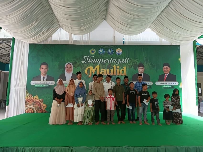 Bukan Sekadar Seremonial, Pembina UNIKI Bireuen Amiruddin Idris Rangkul dan Santuni Anak Yatim di Peringatan Maulid